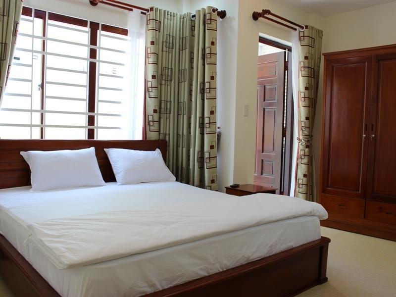 Garnet Hotel Nha Trang Quarto foto